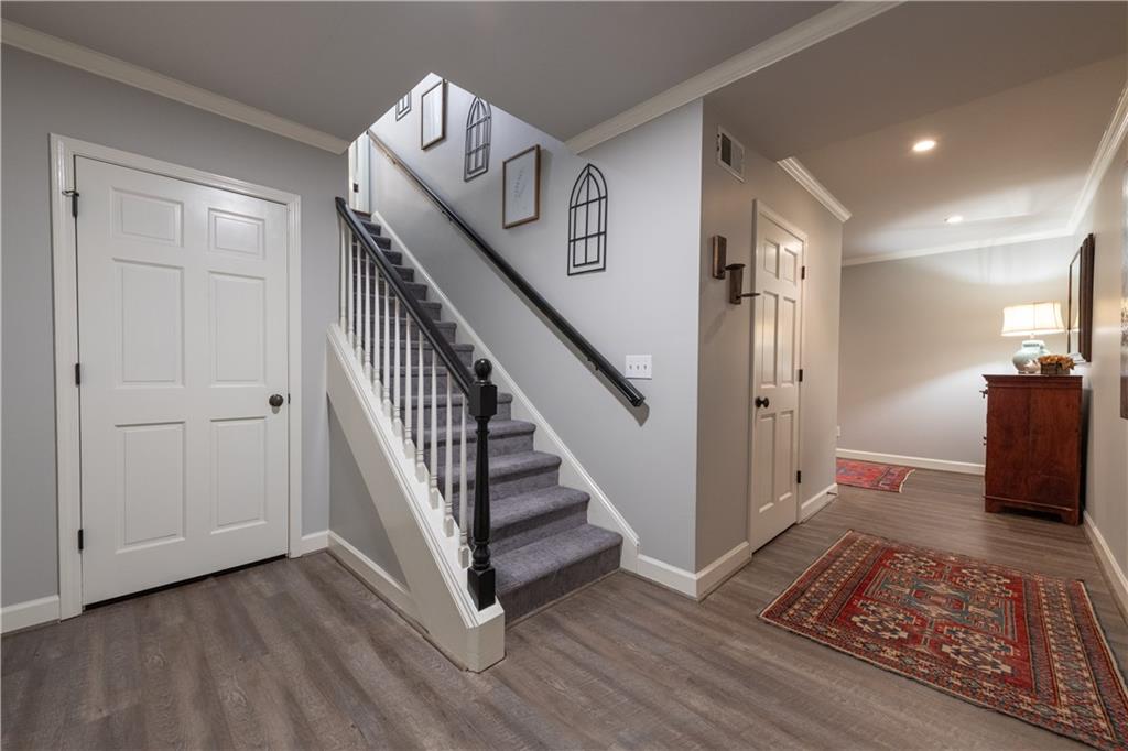 4220 Exeter Close Northwest Atlanta, GA 30327 - Photo 25 of 61 a view of entryway with wooden floor