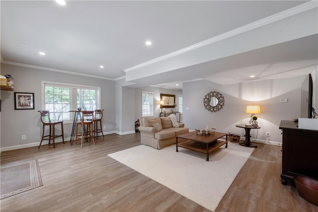 4220 Exeter Close Northwest Atlanta, GA 30327 - Photo 28 of 61 a living room with furniture and a window