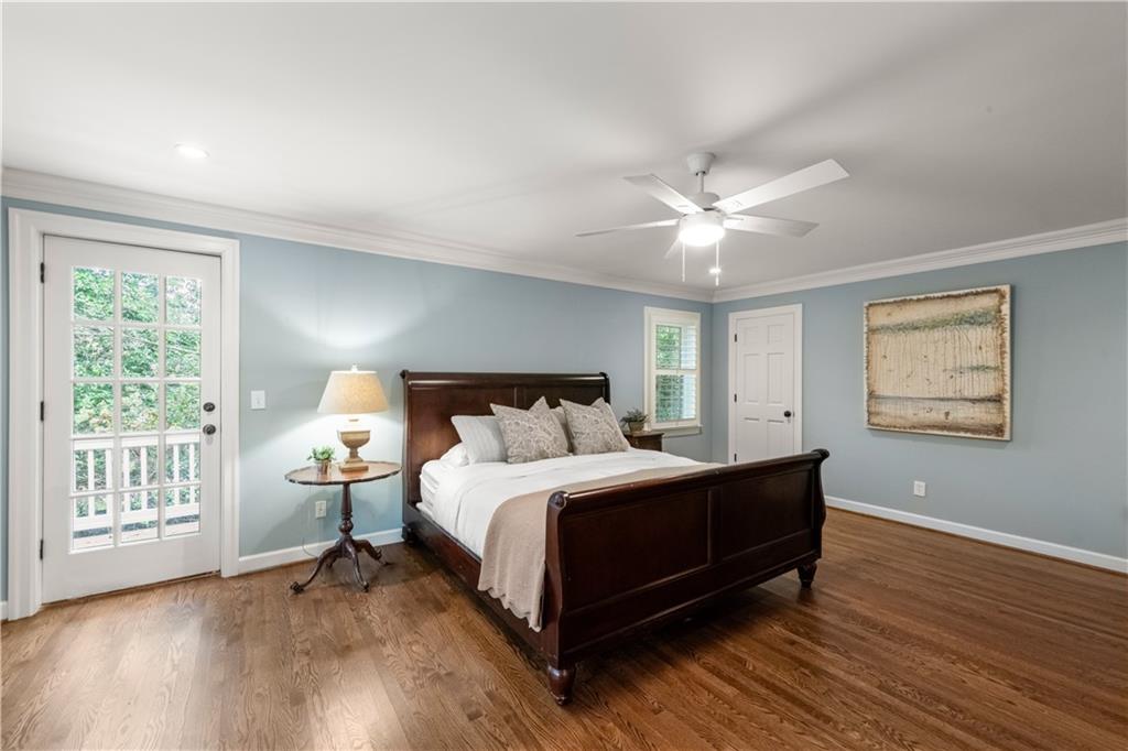 4220 Exeter Close Northwest Atlanta, GA 30327 - Photo 33 of 61 a bedroom with a bed and window