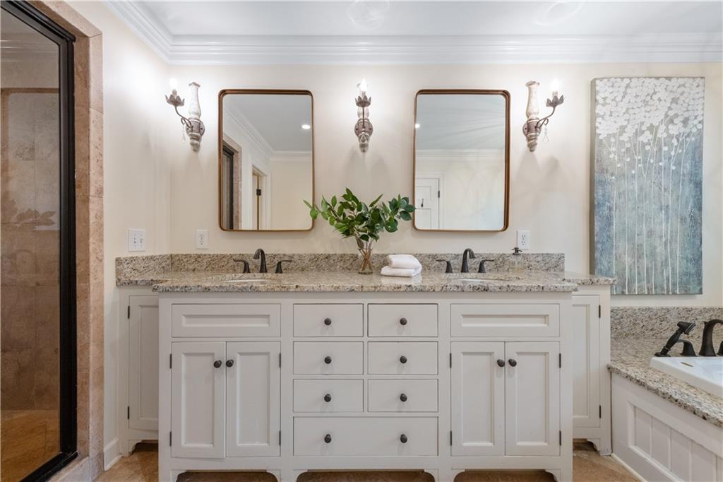 4220 Exeter Close Northwest Atlanta, GA 30327 - Photo 35 of 61 a bathroom with double sink and a mirror