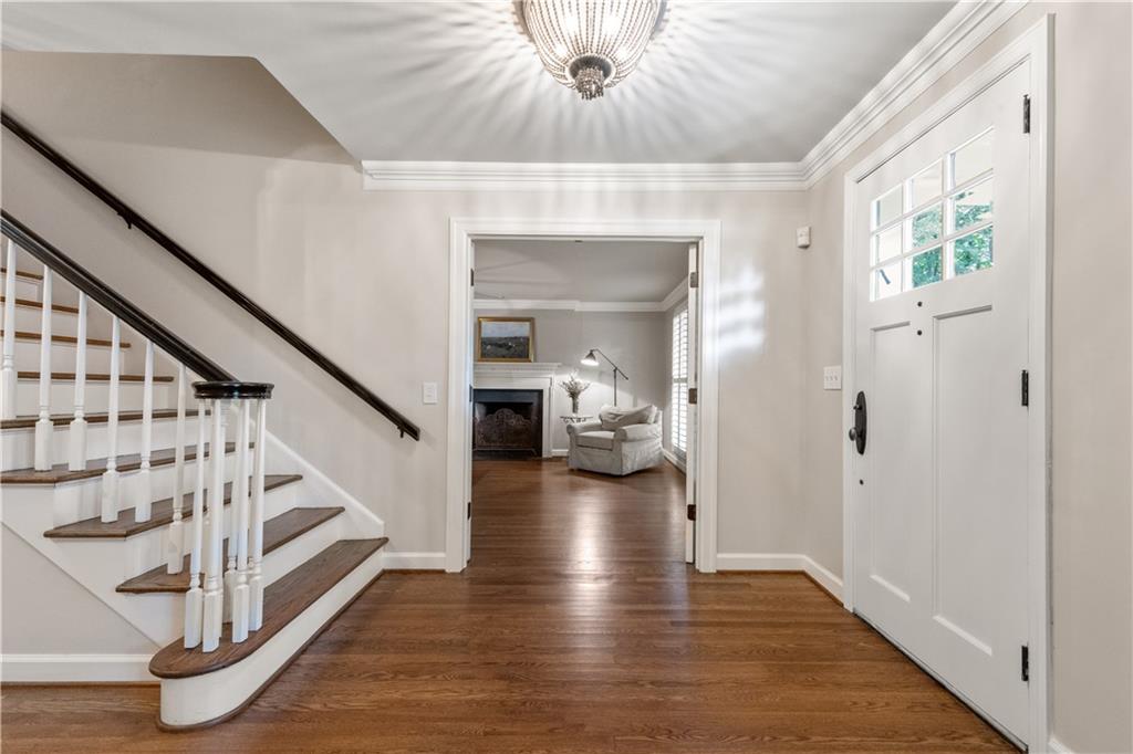 4220 Exeter Close Northwest Atlanta, GA 30327 - Photo 38 of 61 a view of a hallway view with wooden floor and staircase