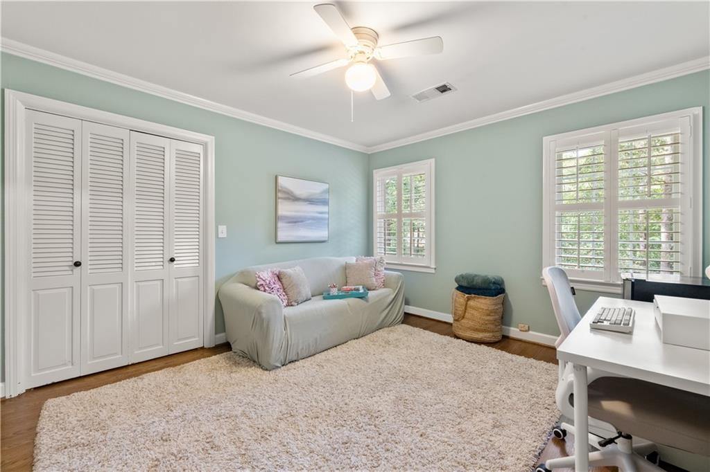 4220 Exeter Close Northwest Atlanta, GA 30327 - Photo 43 of 61 a living room with furniture and a window