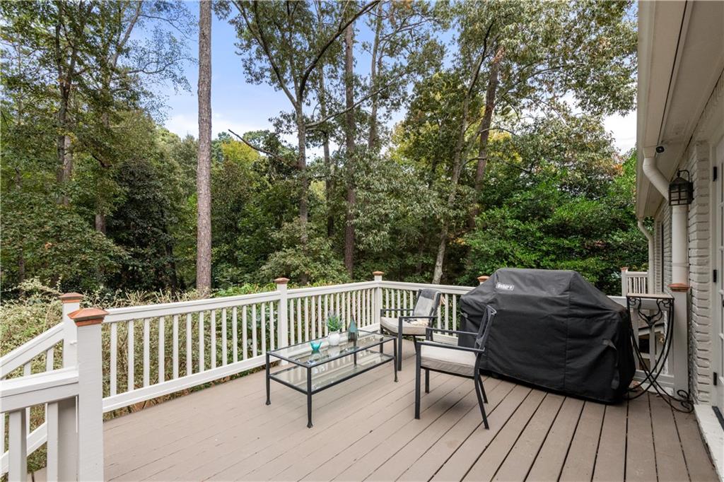 4220 Exeter Close Northwest Atlanta, GA 30327 - Photo 48 of 61 a view of balcony with furniture and trees