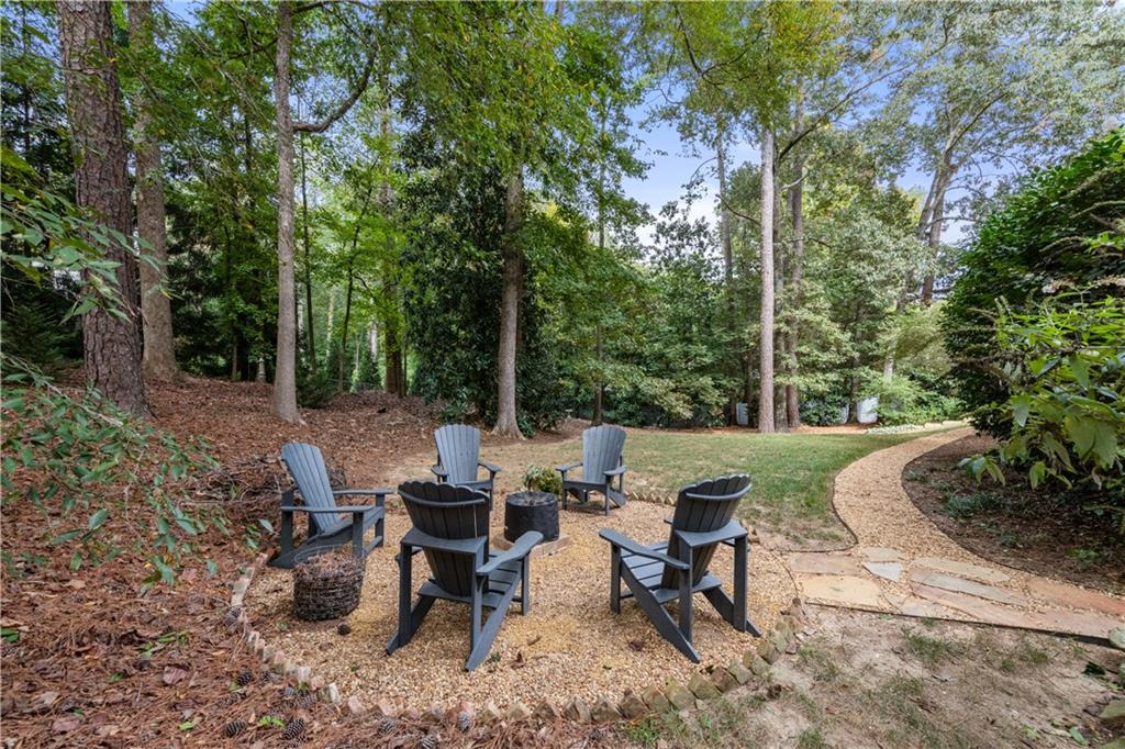 4220 Exeter Close Northwest Atlanta, GA 30327 - Photo 51 of 61 a view of a patio with chairs and a table