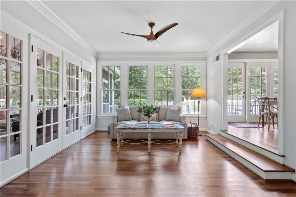 4220 Exeter Close Northwest Atlanta, GA 30327 - Photo 6 of 61 a living room with furniture and a large window