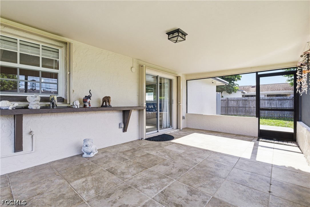 4960 20th Place Southwest Naples, FL 34116 - Photo 23 of 33 a view of an empty room with a window