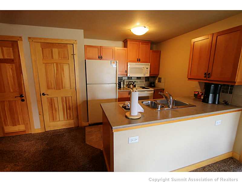 Kitchen. This condo is offered with all small and large kitchen appliances. All pots, pans, dishware,glassware and  silver ETC as well.