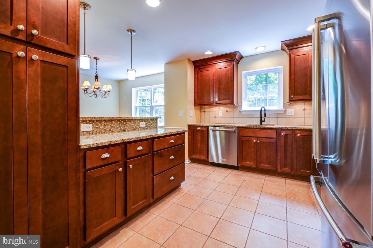 11711 Stillbrook Court Reston, VA 20191 - Photo 13 of 49 Cherry Cabinets with Beautiful Molding