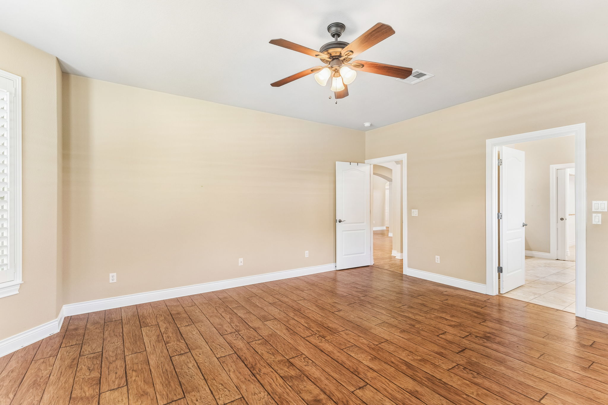 4802 Hidden Springs Trail Georgetown, TX 78633 - Photo 17 of 38 Master Bedroom - complete with plantation shutters