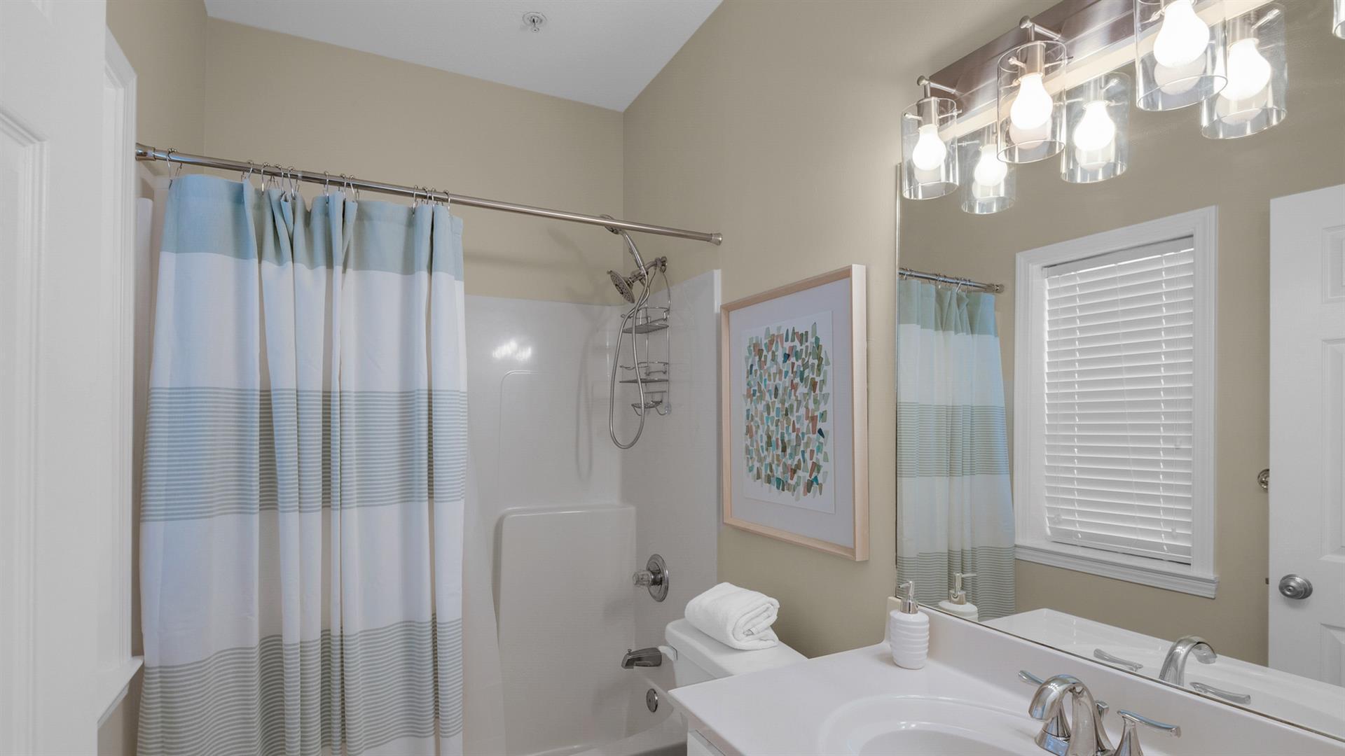 34 Heron's Watch Way, Unit 5101 Santa Rosa Beach, FL 32459 - Photo 19 of 33 a bathroom with a shower a toilet and a sink