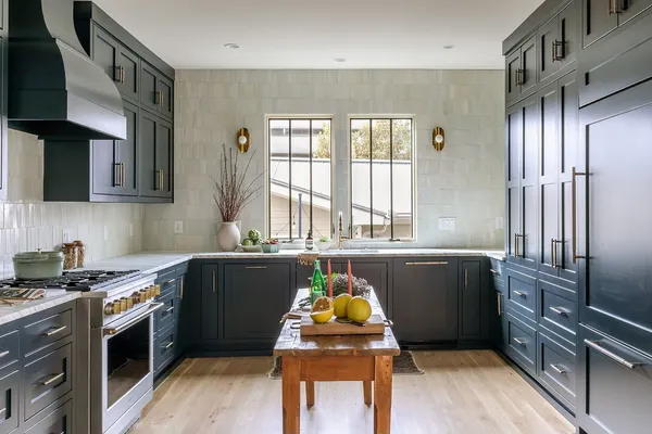 a kitchen with a sink and cabinets