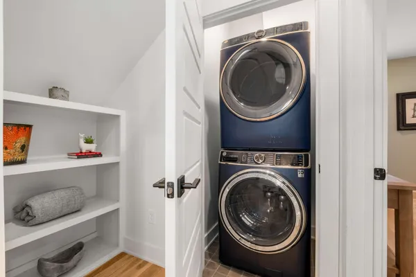 a spacious bathroom with a double vanity sink and mirror