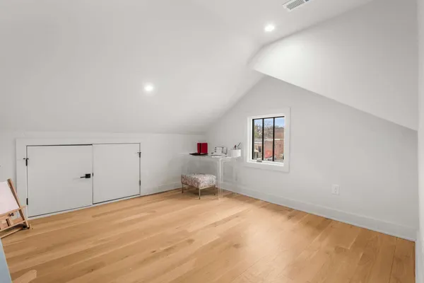 a bathroom with a tub and shower