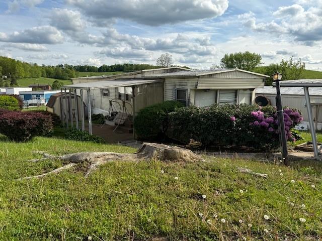 100 Rt 21 Estates Carmichaels, PA 15320 - Photo 1 of 21 a view of house with a garden