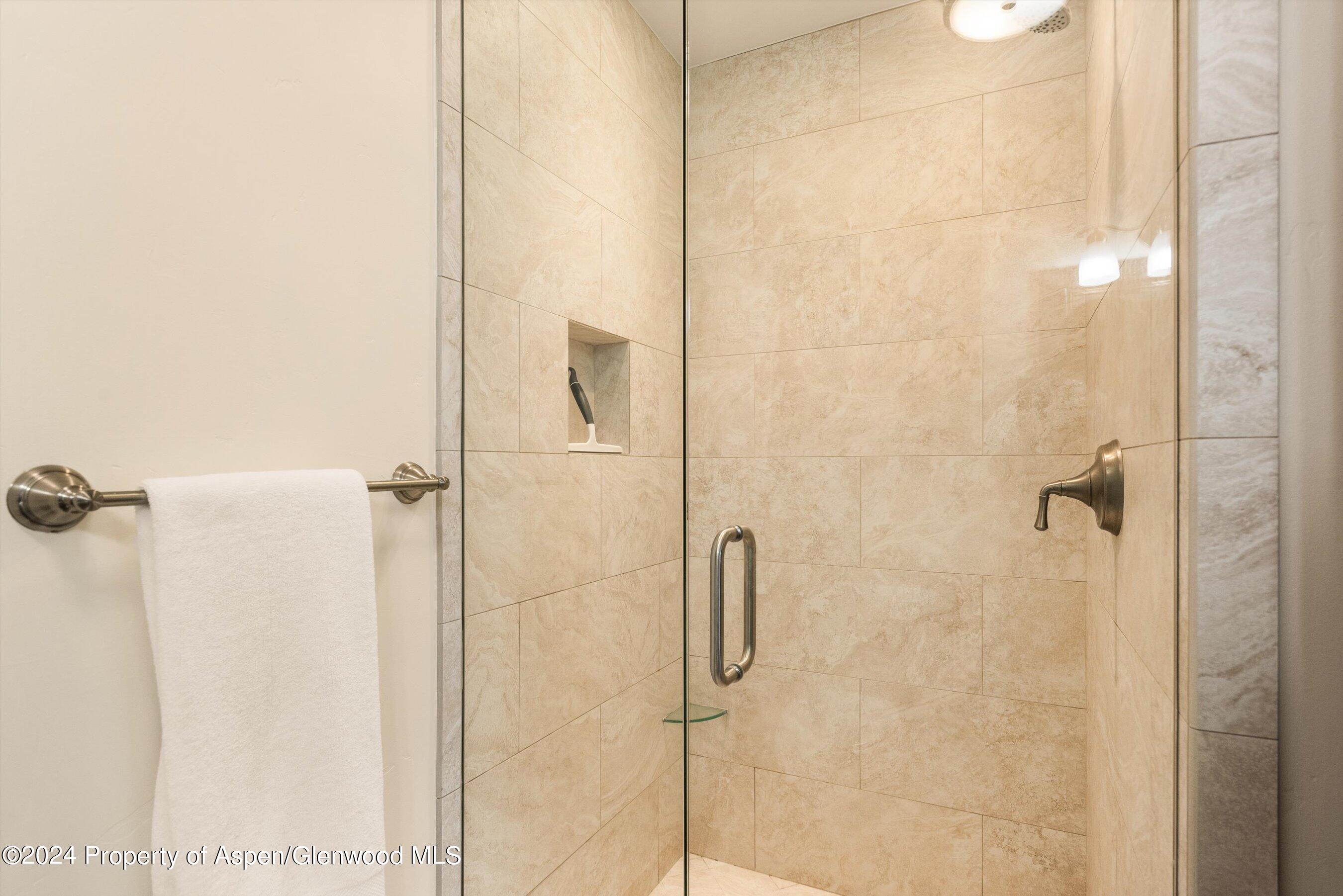 374 Meadow Ranch Road Snowmass Village, CO 81615 - Photo 16 of 22 a bathroom with a shower