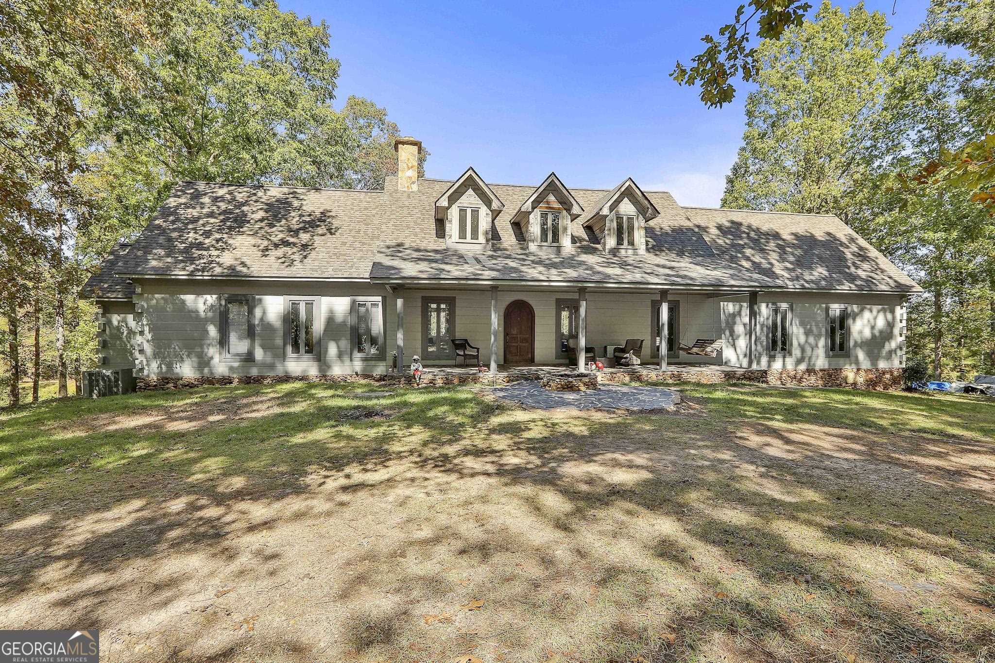 325 Old 4 Notch Road Whitesburg, GA 30185 - Photo 1 of 1 a front view of a house with a yard
