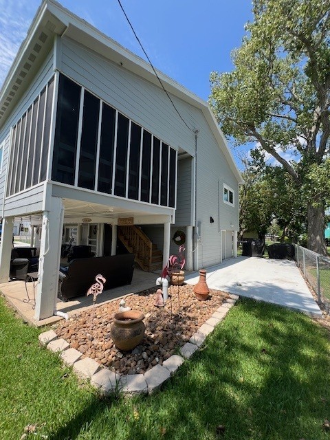 182 County Road 257 Matagorda, TX 77457 - Photo 1 of 24 a view of a house with a yard and sitting area