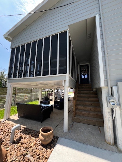 182 County Road 257 Matagorda, TX 77457 - Photo 2 of 24 a view of a balcony with chairs and a potted plant