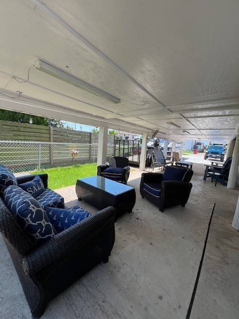 182 County Road 257 Matagorda, TX 77457 - Photo 21 of 24 a living room with furniture and a large window