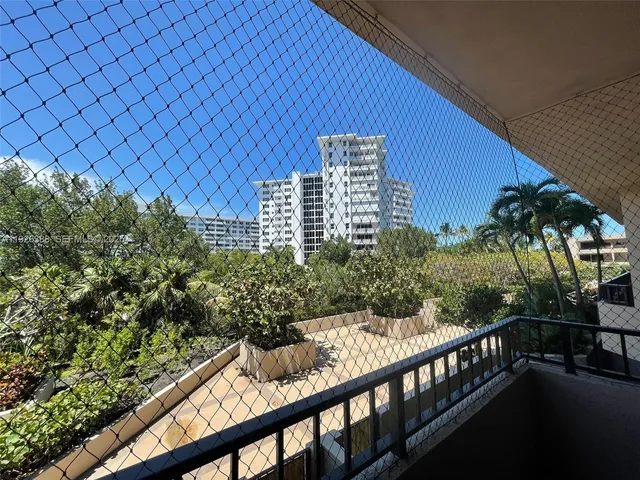 a view of a balcony with an outdoor space