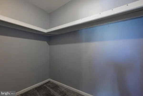 a bathroom with a toilet sink and shower