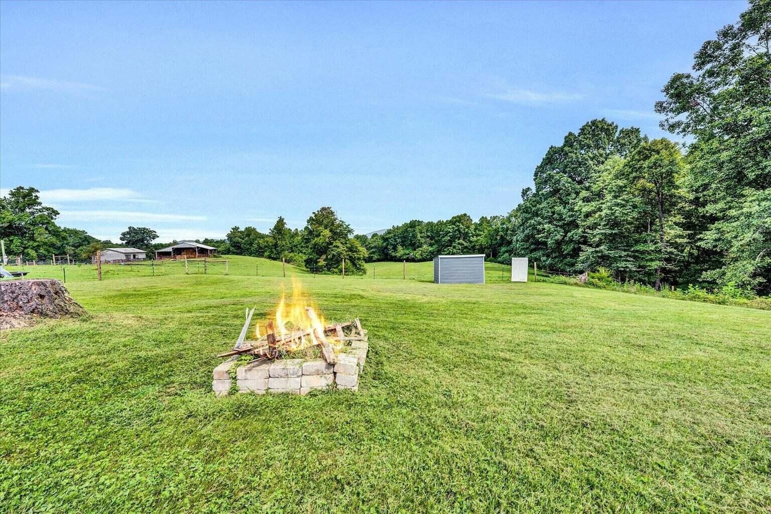 311 Moorman Road Hardy, VA 24101 - Photo 29 of 29 a view of a lake with a yard