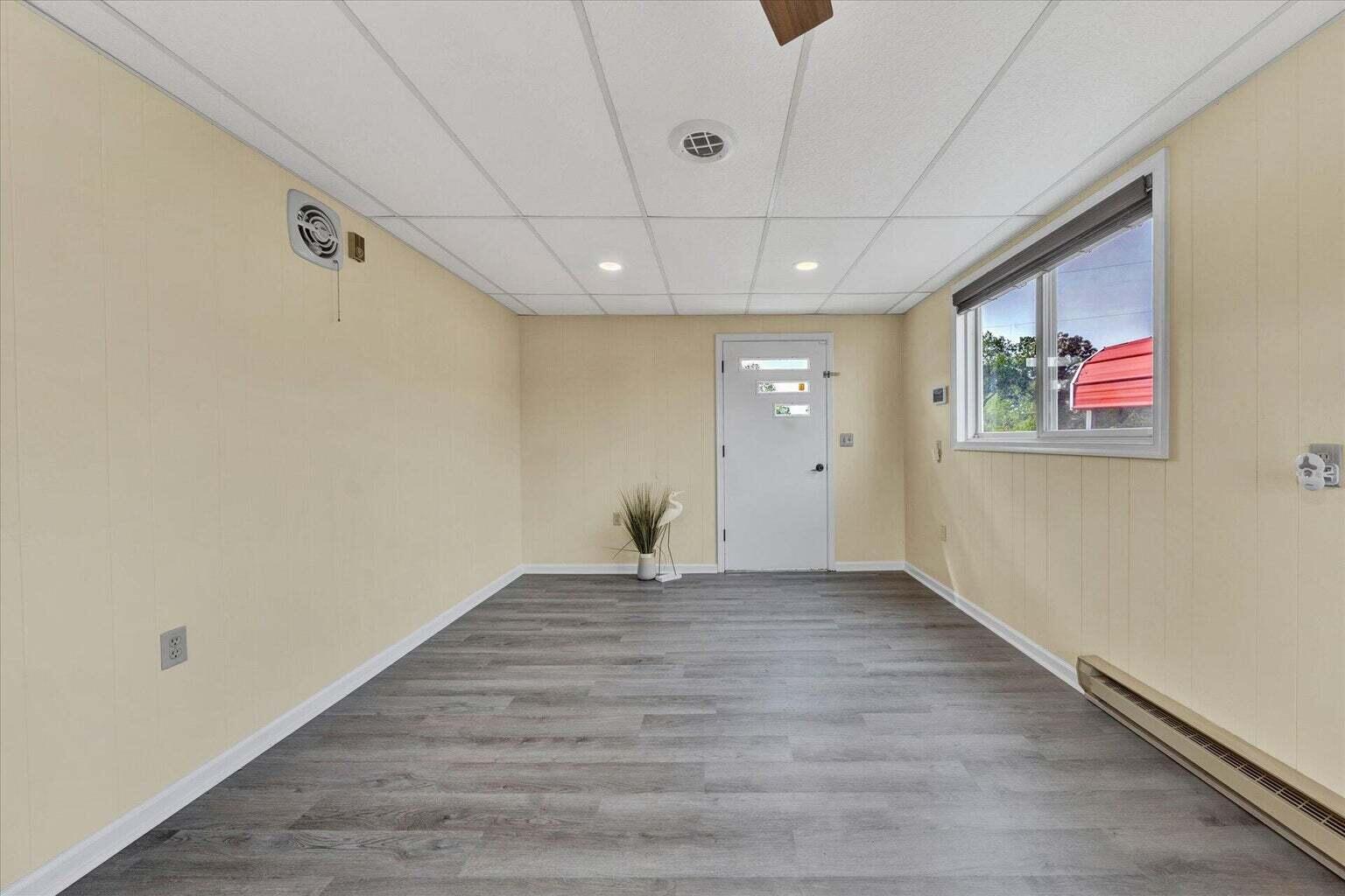 311 Moorman Road Hardy, VA 24101 - Photo 10 of 29 a view of empty room with wooden floor