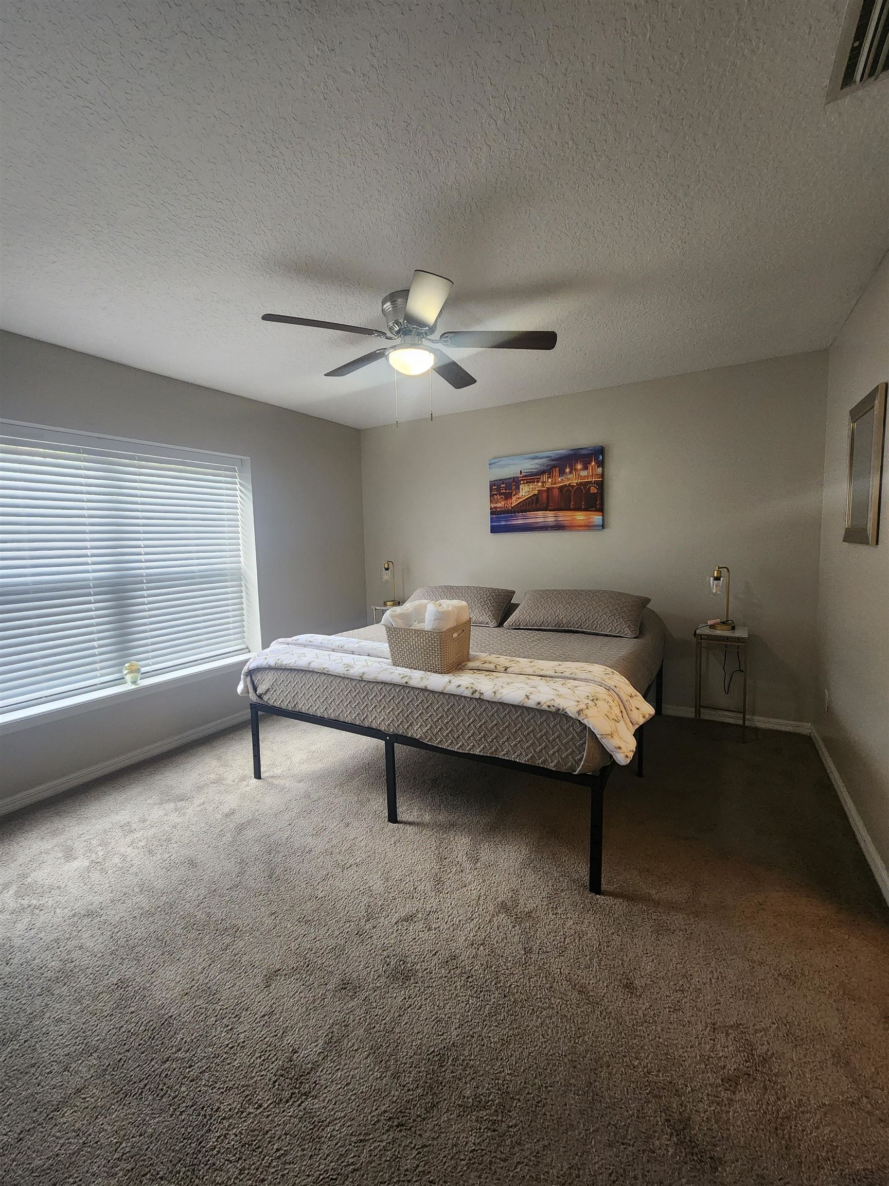 162 Stewart Street St. Augustine, FL 32084 - Photo 13 of 23 a living room with furniture and a window