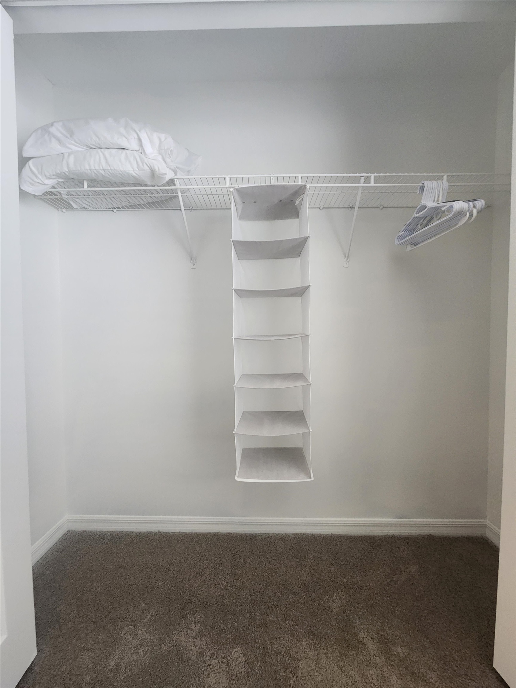 162 Stewart Street St. Augustine, FL 32084 - Photo 8 of 23 a view of a room with racks on the wall