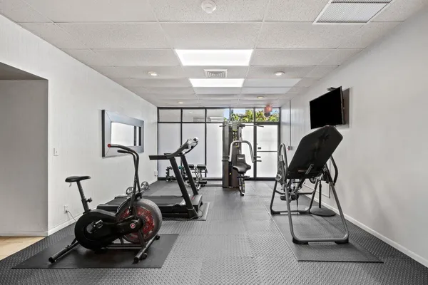 a view of a room with gym equipment