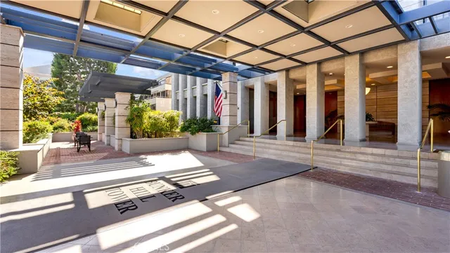 a building exterior with furniture