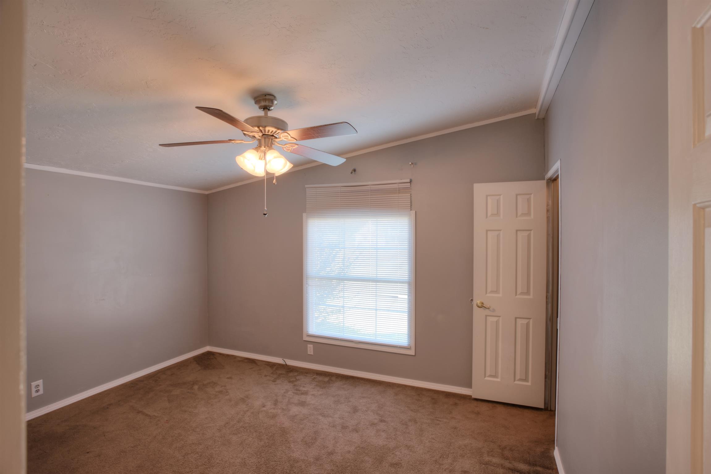 3343 Ridge Road Columbia, TN 38401 - Photo 18 of 27 a view of an empty room with a window