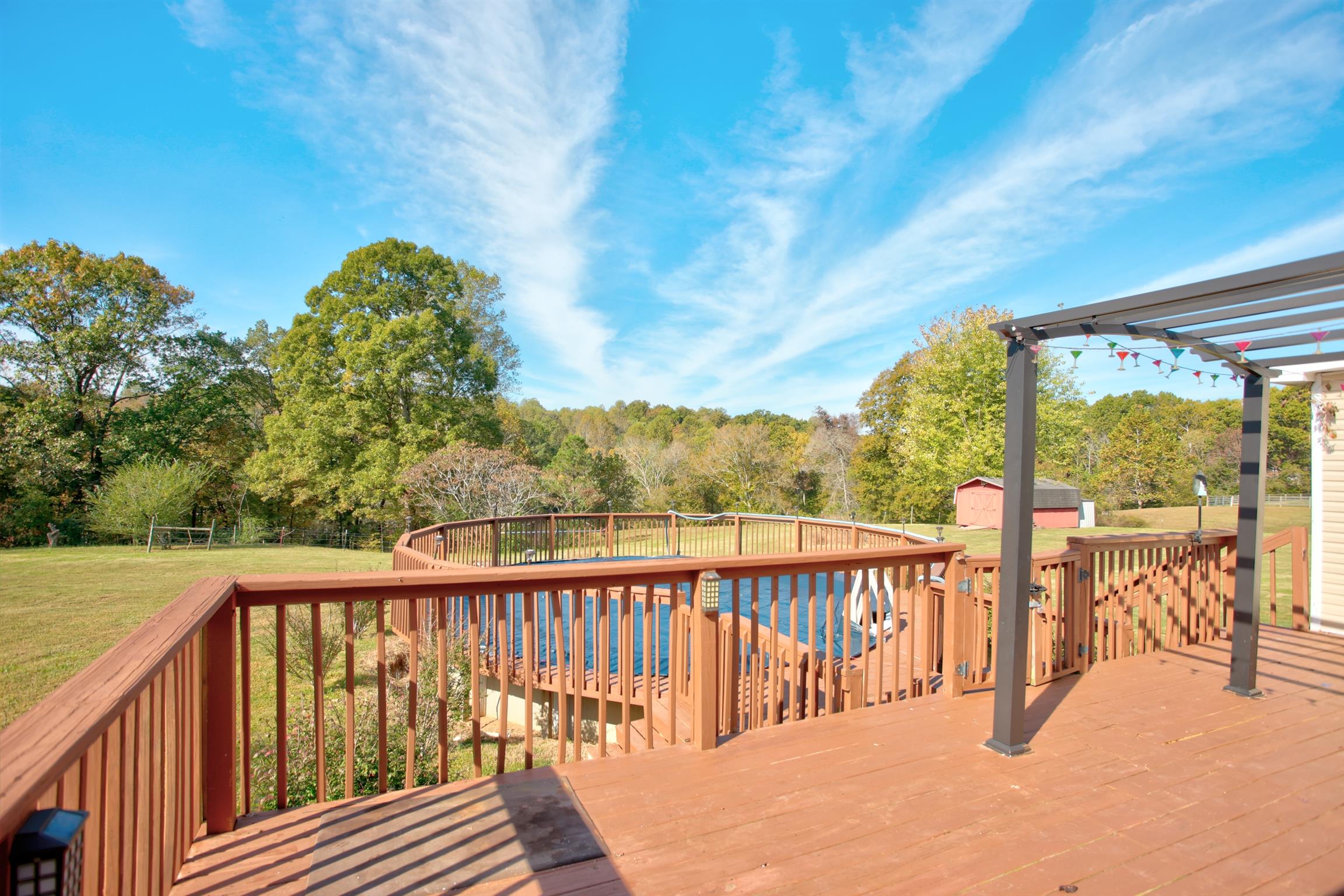 3343 Ridge Road Columbia, TN 38401 - Photo 25 of 27 a view of a balcony with floor to ceiling window and wooden fence