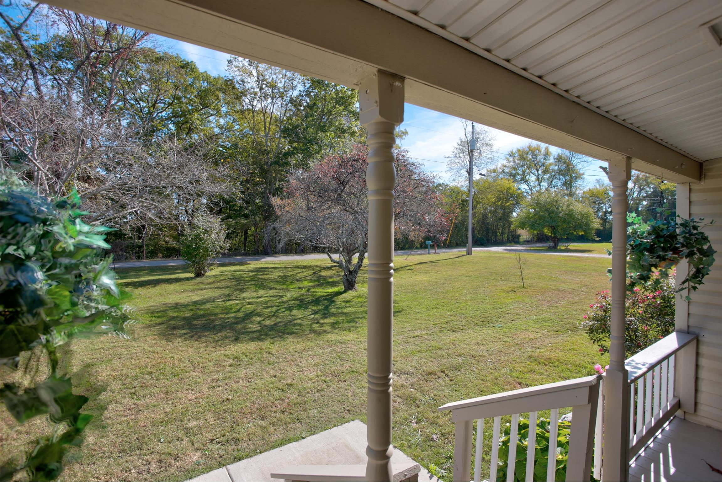 3343 Ridge Road Columbia, TN 38401 - Photo 5 of 27 a view of a wooden deck with a yard