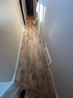 a bed room with a bed and a window