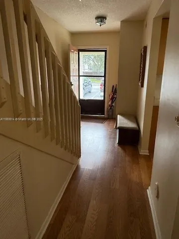 a view of livingroom with furniture and a window