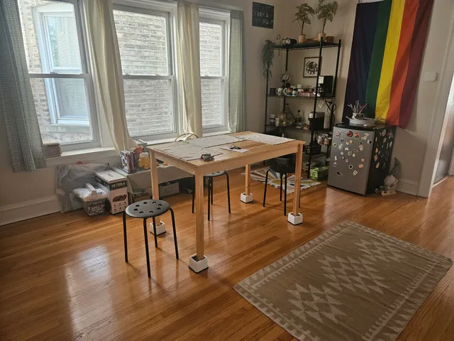 a view of a livingroom with furniture and window