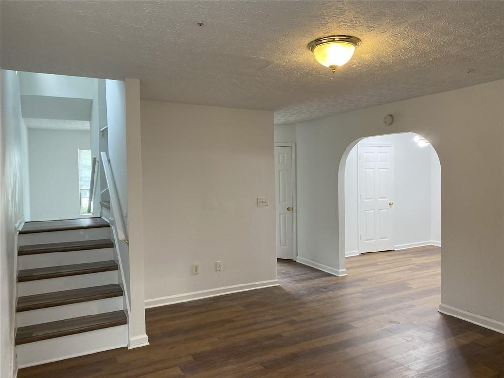 1754 Soapstone Court Decatur, GA 30034 - Photo 8 of 19 a view of a room with wooden floor and white walls