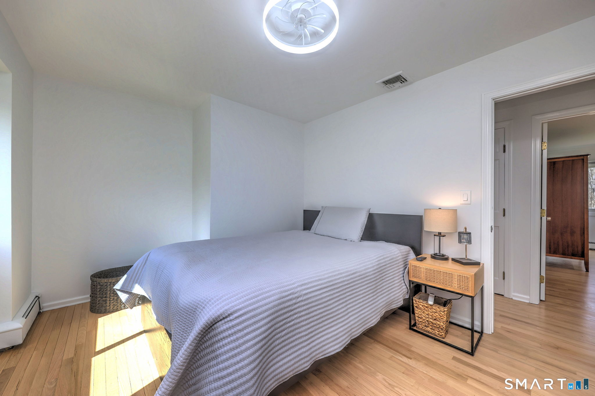 48 Nancy Drive Monroe, CT 06468 - Photo 27 of 38 a bedroom with a bed and a table