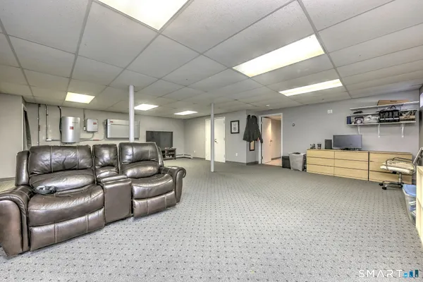 a living room with furniture and a couch
