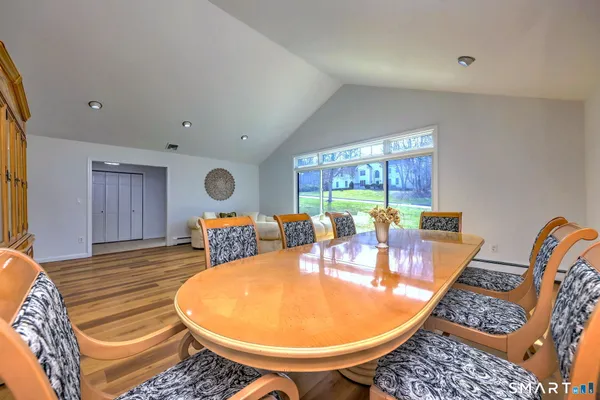 a living room with furniture and a table