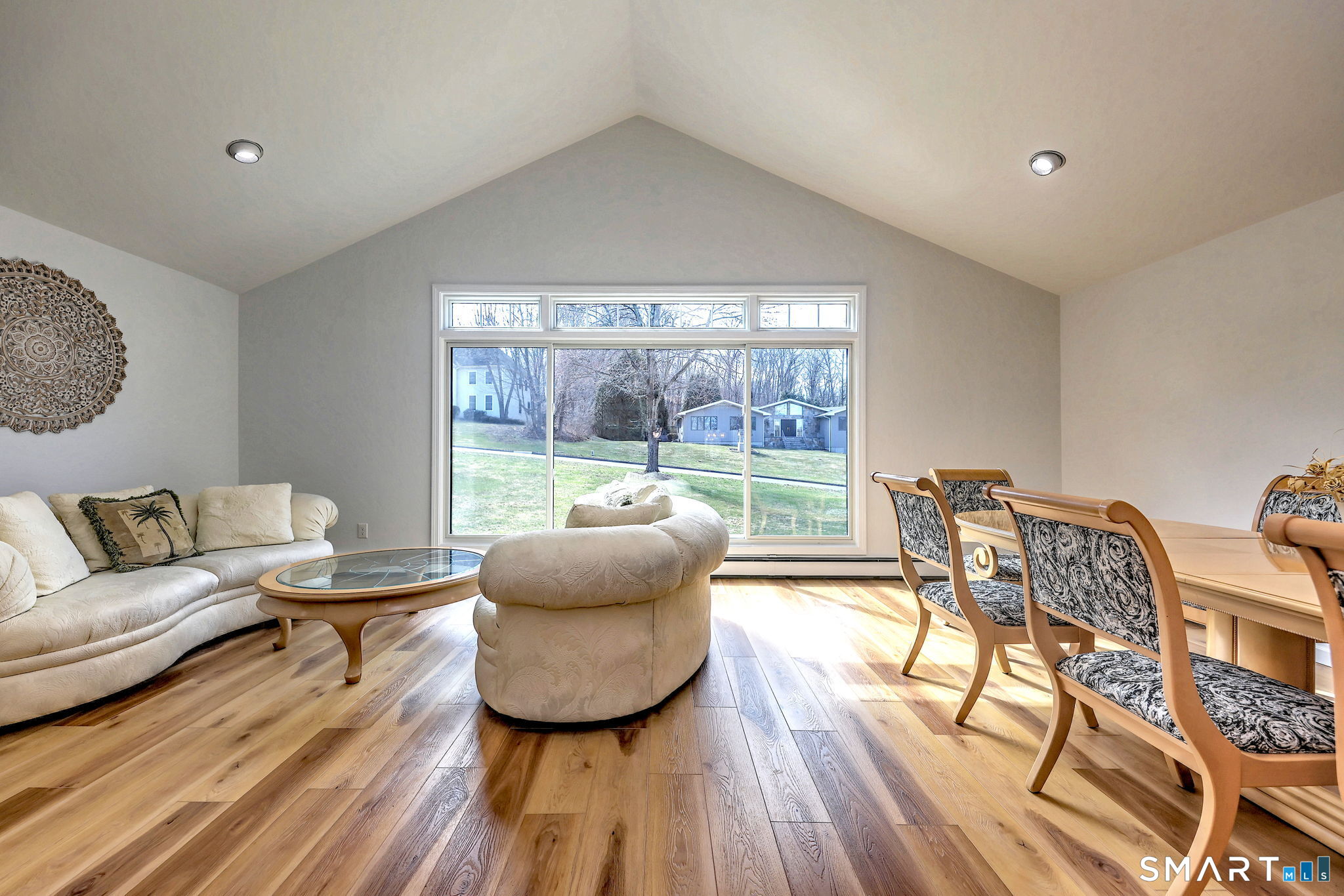 48 Nancy Drive Monroe, CT 06468 - Photo 7 of 38 a living room with furniture and a wooden floor