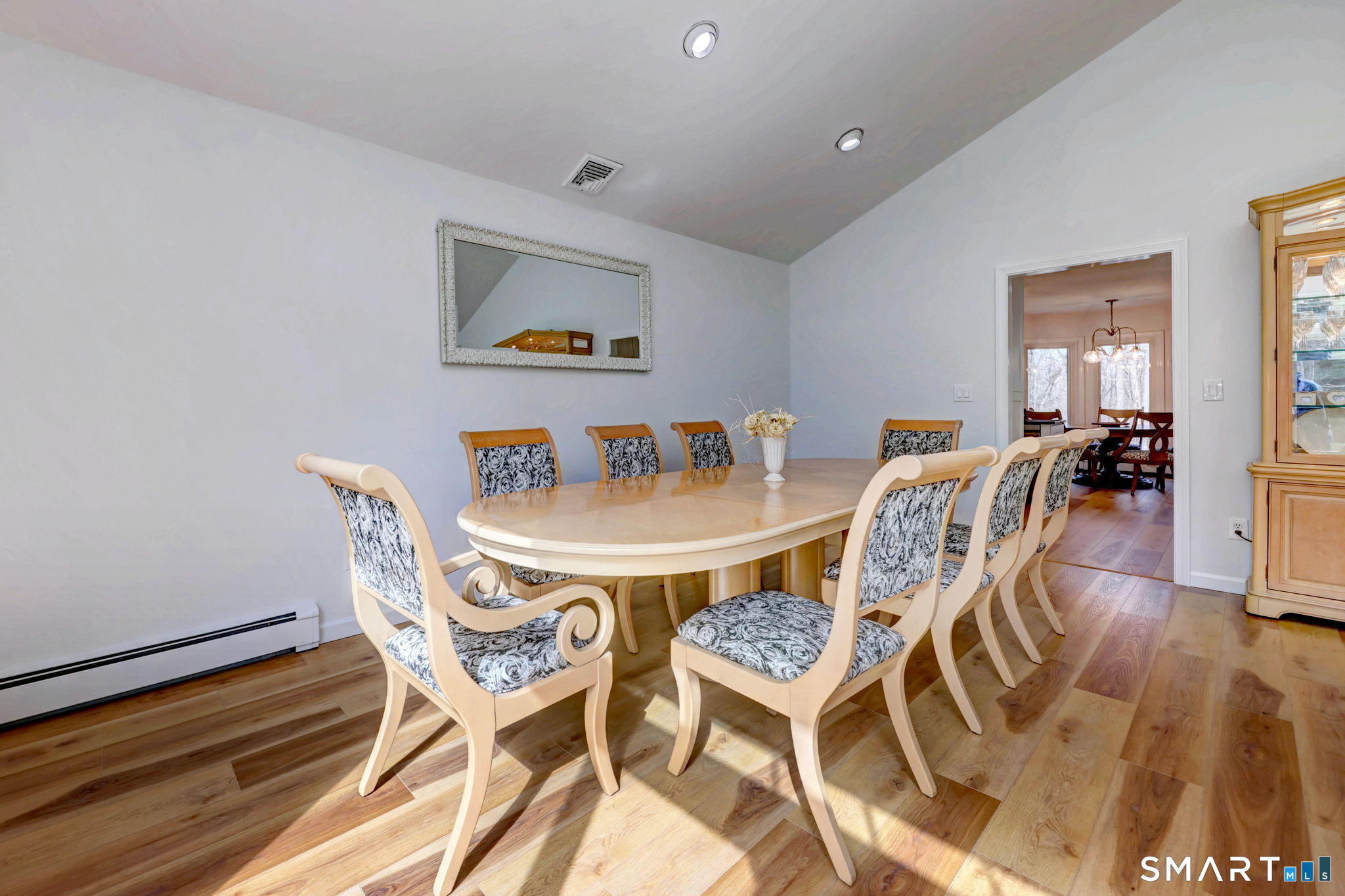 48 Nancy Drive Monroe, CT 06468 - Photo 8 of 38 a view of a dining room with furniture and wooden floor
