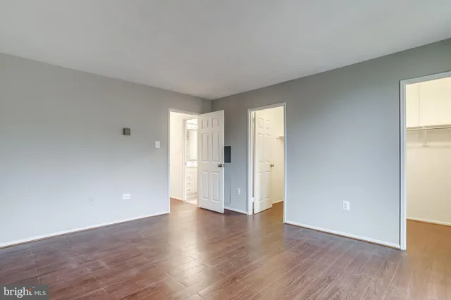 a view of a livingroom with wooden floor