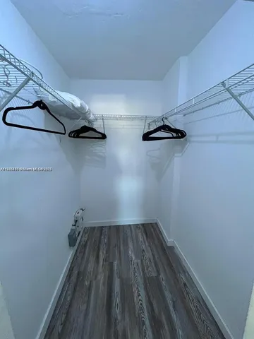 a view of a room with rack on the wall