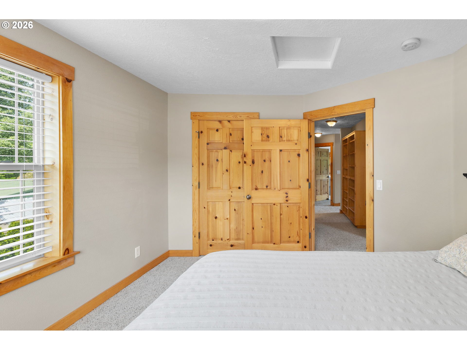 210 Southeast Whitten Road Mill City, OR 97360 - Photo 30 of 48 a bedroom with a wooden door