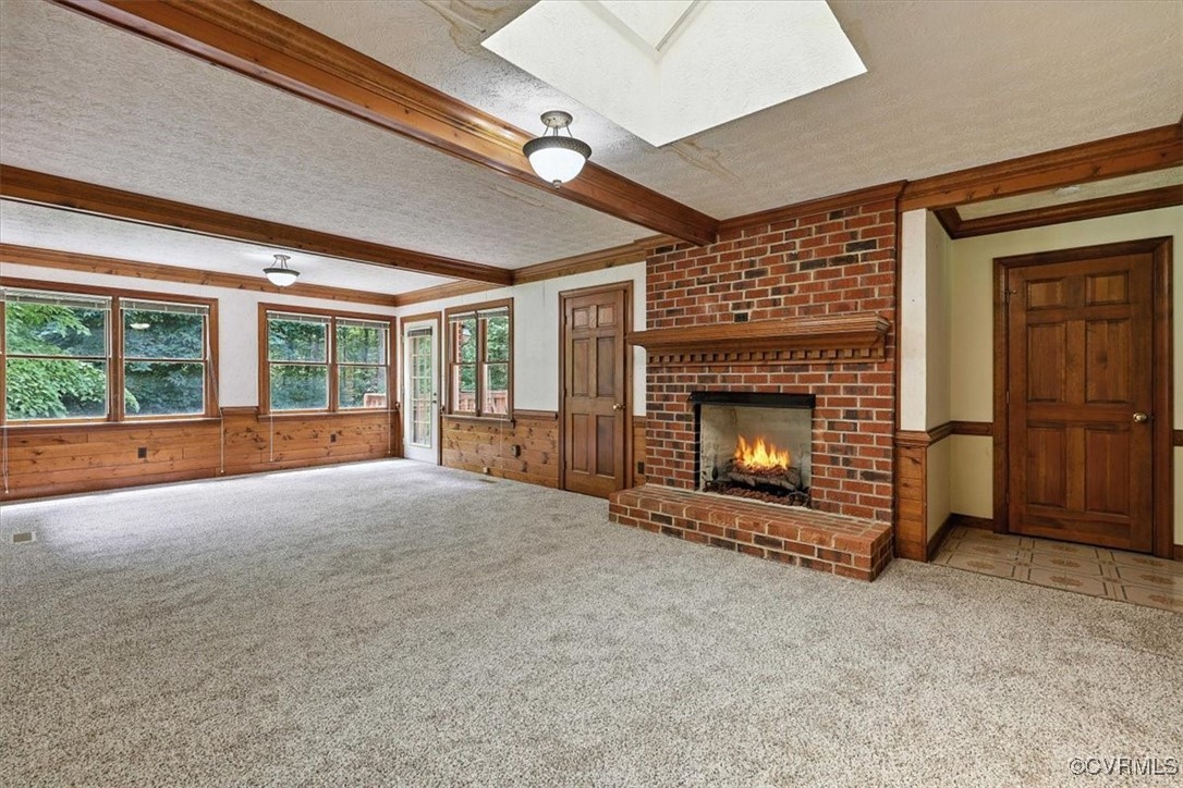 5552 Quail Ridge Terrace Chesterfield, VA 23832 - Photo 10 of 32 a view of an empty room with a fireplace and a window