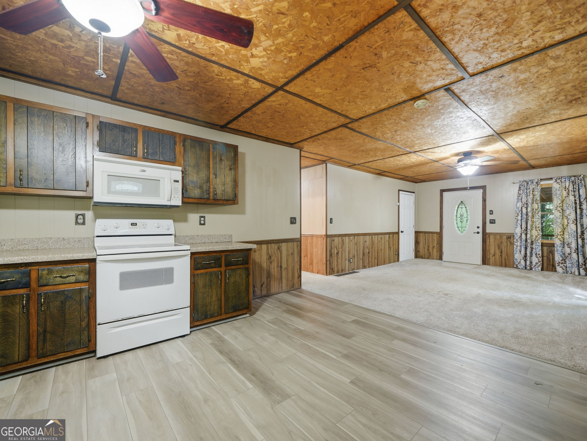 629 Goose Island Road Cherry Log, GA 30522 - Photo 9 of 52 a kitchen with stainless steel appliances granite countertop a stove cabinets and wooden floor