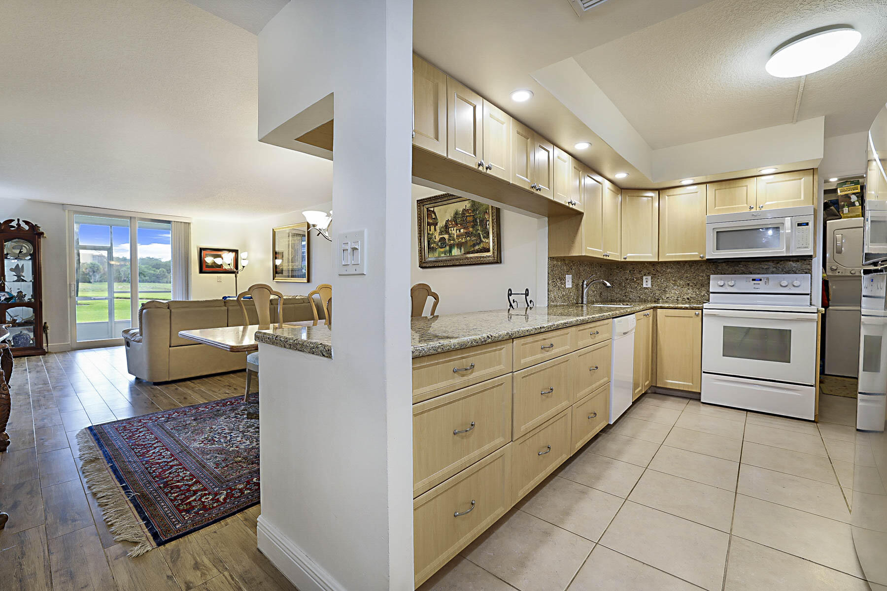 250 Northwest 67th Street, Unit 119 Boca Raton, FL 33487 - Photo 1 of 30 Kitchen/Living Room