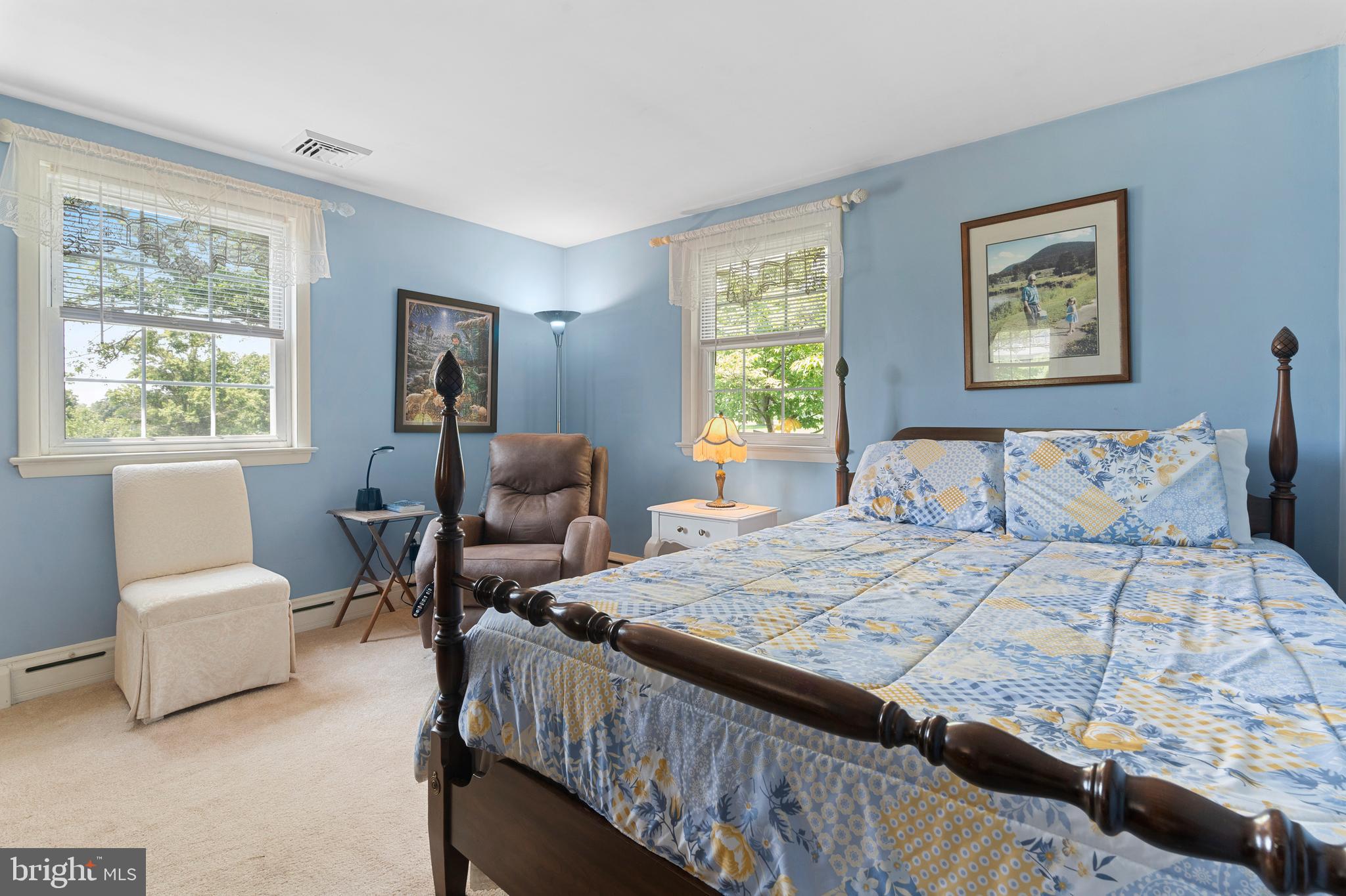 648 Creamery Road Telford, PA 18969 - Photo 29 of 52 a bedroom with a bed and a couch